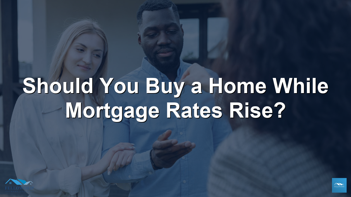 Should you buy a home while mortgage rates rise - couple receiving house keys