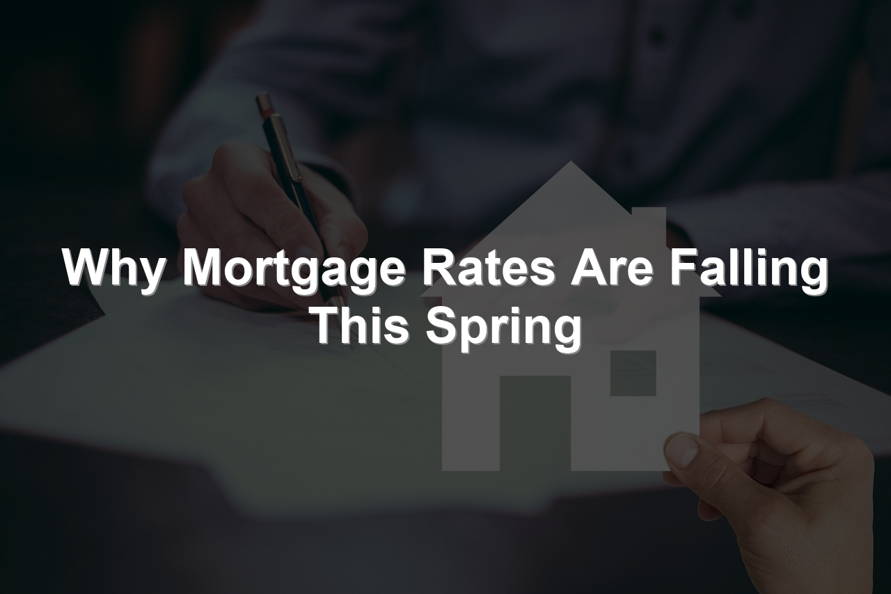 Person signing mortgage documents at a desk with a paper house cutout in the foreground